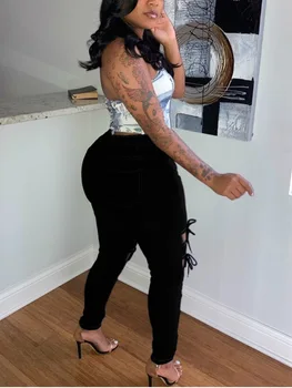 Ir 2021. jaunpienācēji Dāma Augstas Kvalitātes Vidū Vidukļa Džinsus Karstā Pārdošanas Sievietes Black Ripped Džinsi Plus Izmēru XL-5XL Skinny Džinsa Bikses
